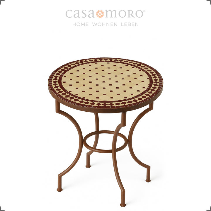 Compact patio table with clear lacquer-sealed wrought iron frame and handmade mosaic