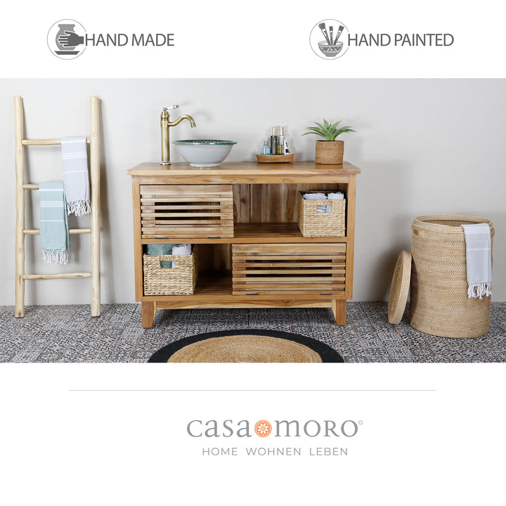 Small round ceramic sink