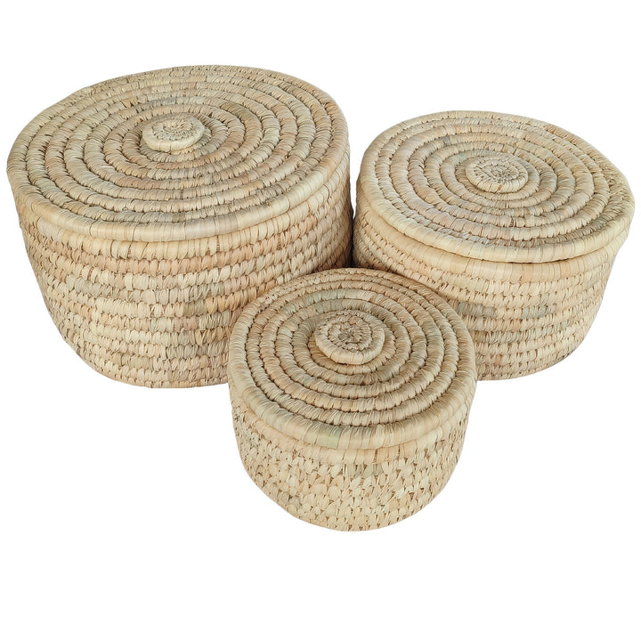 Three round palm-leaf storage baskets with lids: 3.5 liters, 7 liters, and 15 liters in capacity.