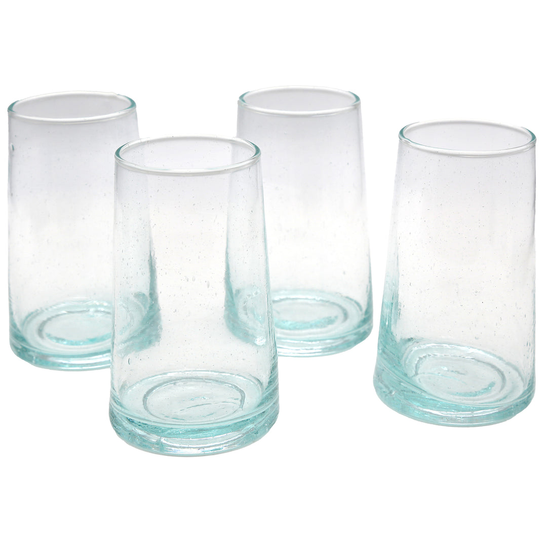 Cocktail glasses with a clear look - served with ice cubes, fruit decorations and fresh mint