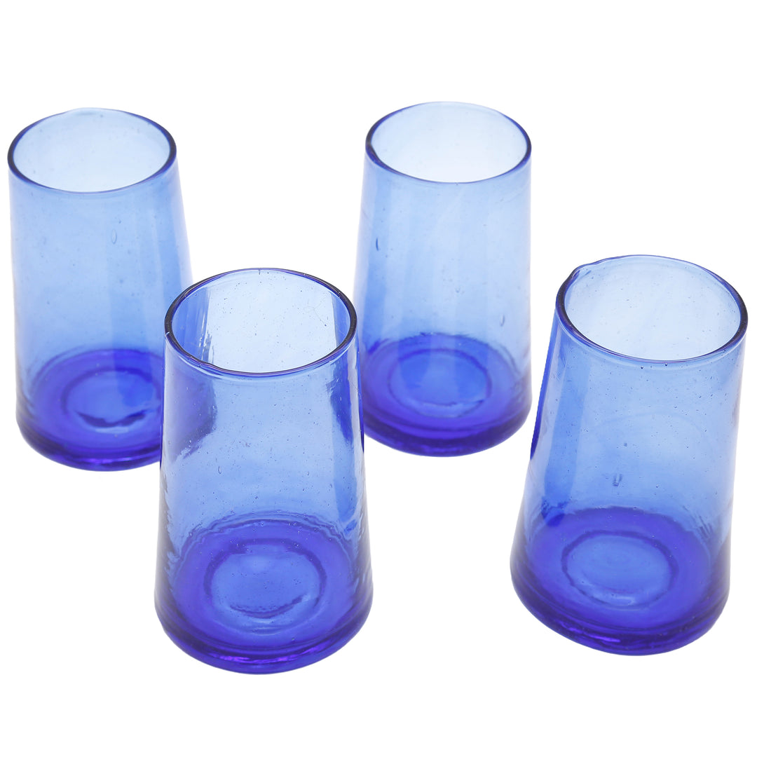 Blue cocktail glasses with summer drinks - perfect for garden parties and drinks with lime