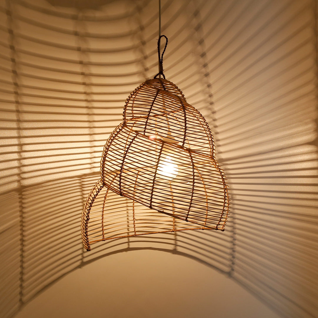 Handcrafted rattan ceiling light with spiral weave and fascinating play of light and shadow