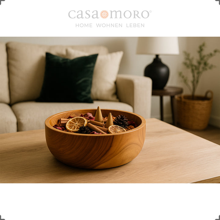 Decorative bowl made of teak wood with natural materials in the living room