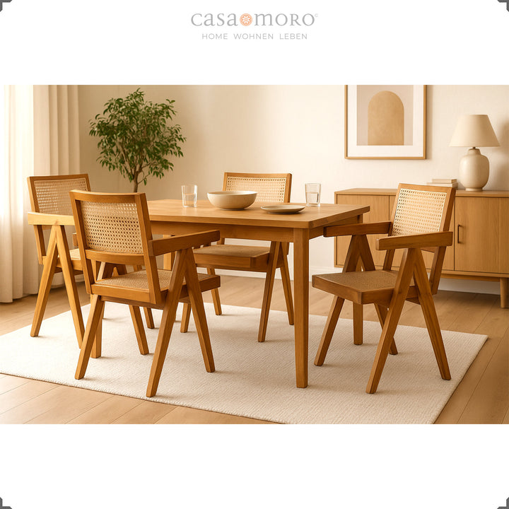 Dining room with four armchairs made of teak and Viennese wicker, harmonious arrangement in a warm natural tone
