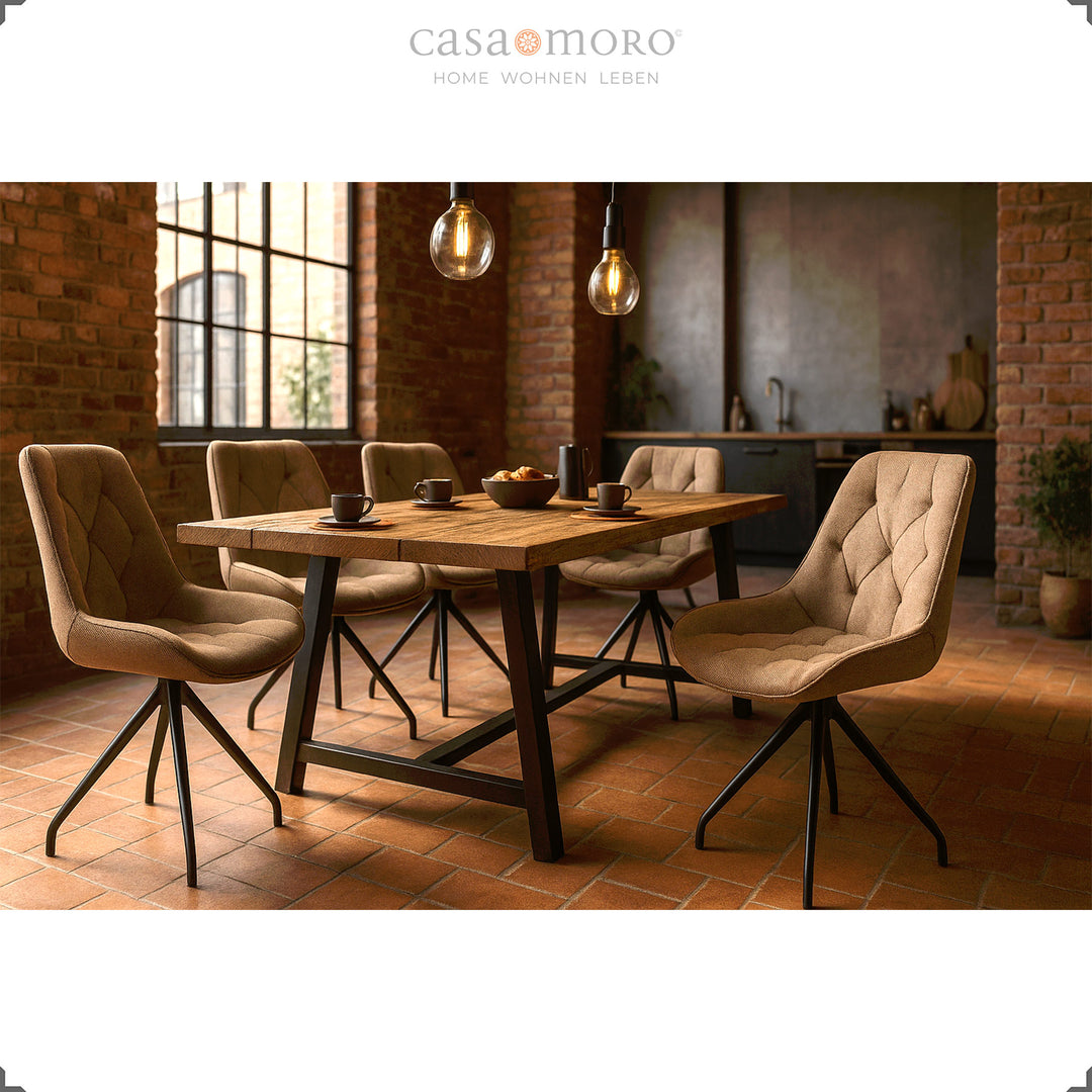 Six upholstered chairs that can be rotated 360° in brown with a black metal frame - modern dining area with a wooden table and an atmospheric loft atmosphere