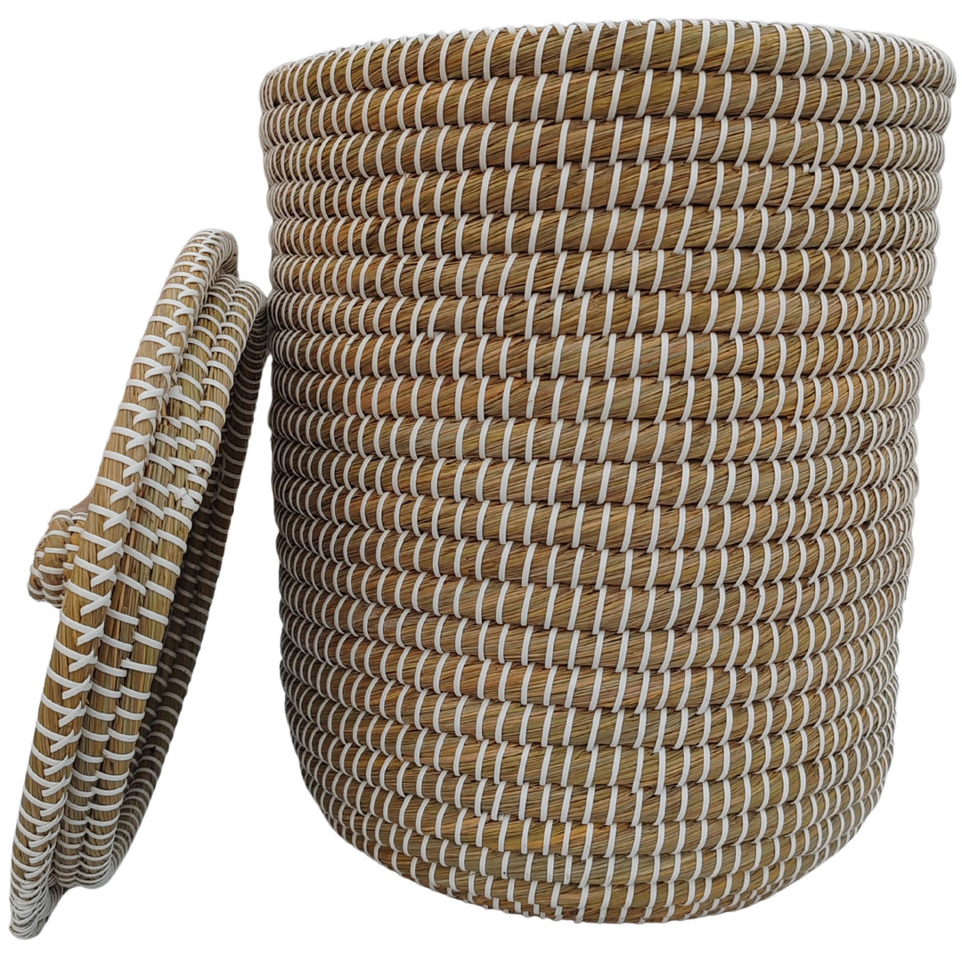 Round woven natural/white seagrass basket, approximately 40 litres, with lid leaning to the side.