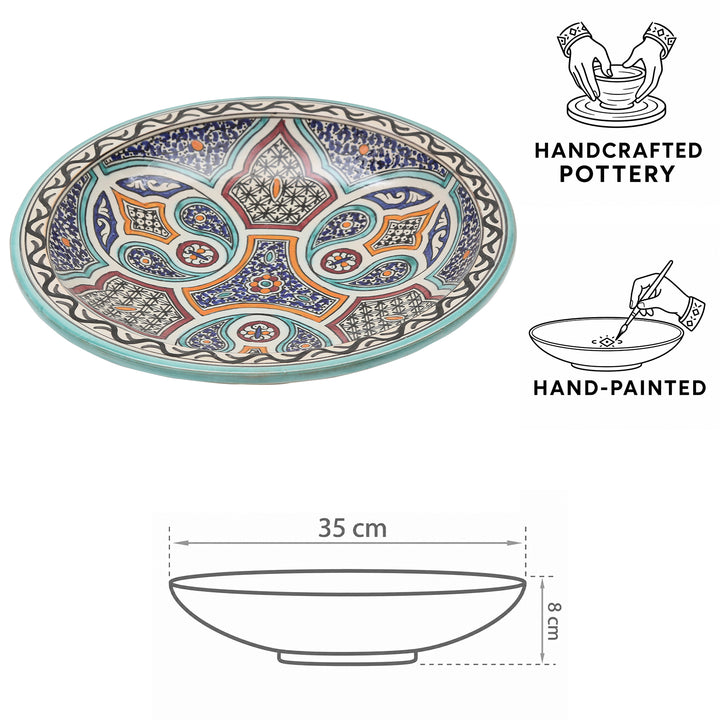 Hand-painted and hand-crafted Moroccan ceramic bowl from Fès with colorful floral and geometric patterns, 35 cm in diameter and 8 cm high