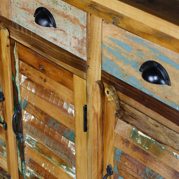 Detailed view of drawers and doors made of solid wood and reclaimed wood in vintage style