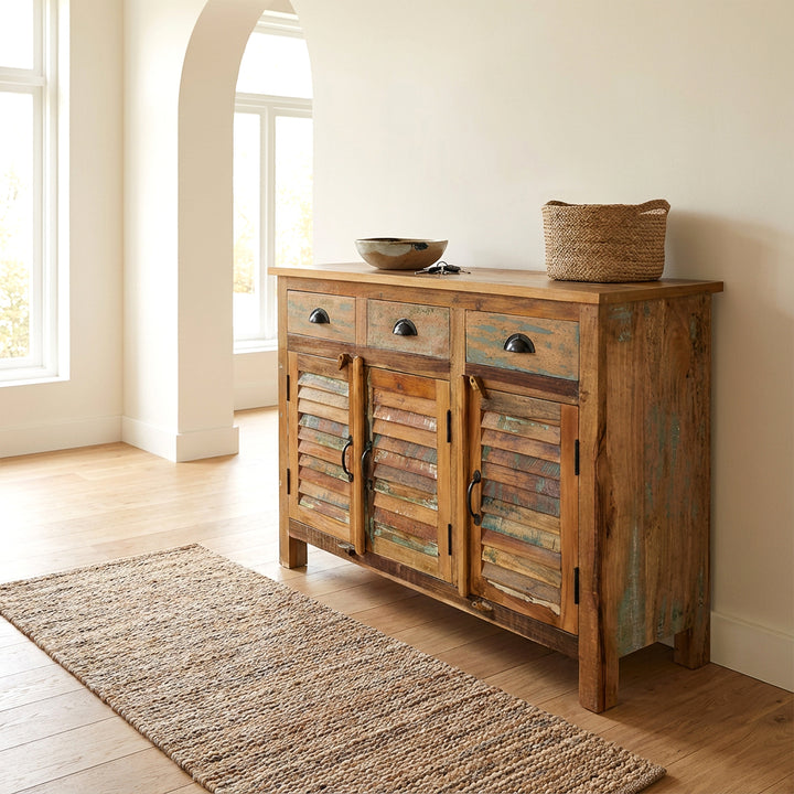  Highboard made of solid wood and old wood in a vintage country house style, placed in the bright living room