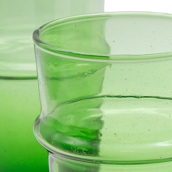 Latte macchiato served in a green glass - glass structure lively & individual