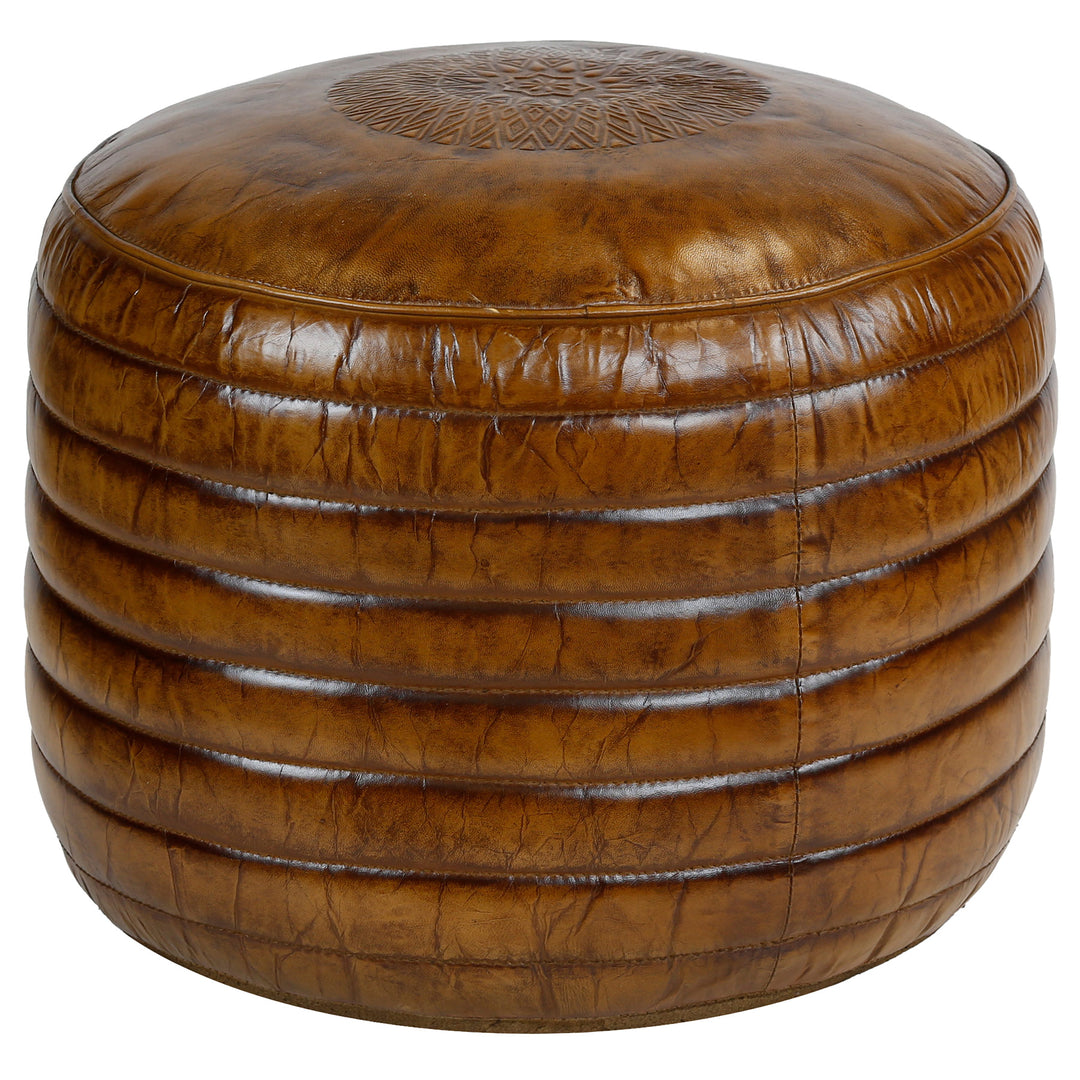 Leather stool in warm brown, circular quilting on the sides, soft upholstery