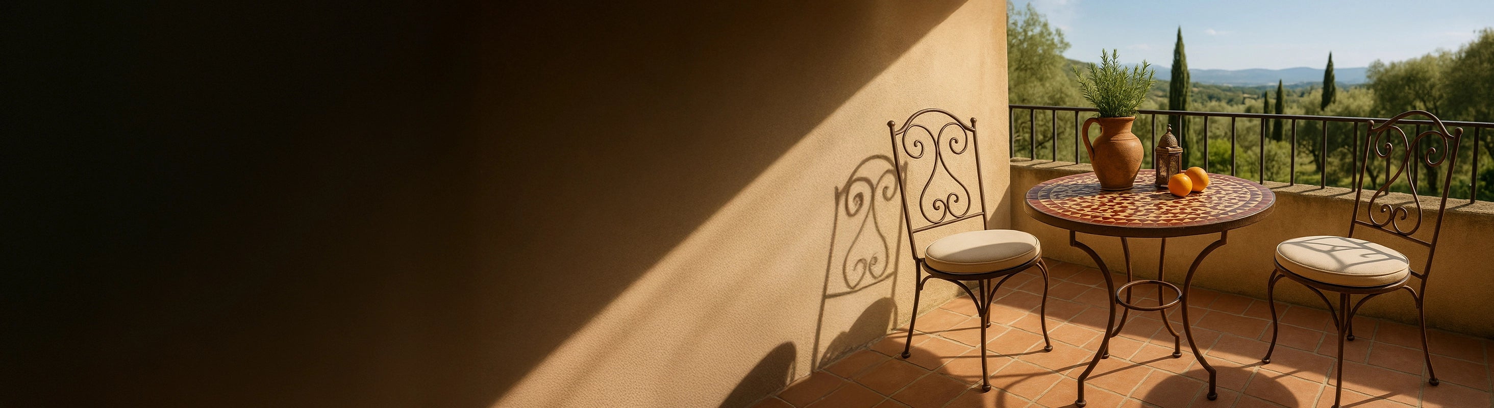 Mosaic tables Ø70 – Round mosaic table Ø70 cm with zellige tiles as a dining table on a sunny terrace with two chairs - ideal for 2 to 3 people.