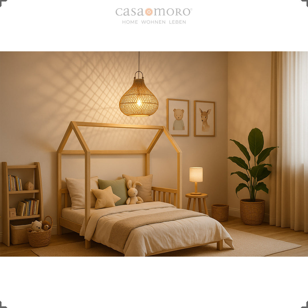 Hanging lamp made of rattan in the children's room above the house bed, warm light and natural furnishings