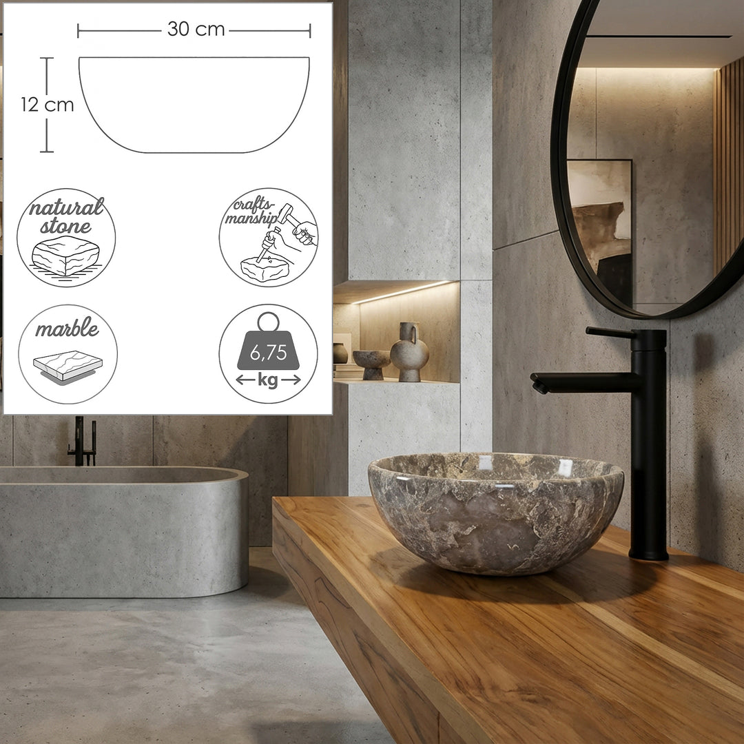 Natural stone countertop washbasin in a gray-brown grain on a wooden console in the modern bathroom, with a black stand-alone fitting and integrated graphic dimensions for diameter, height, material and weight