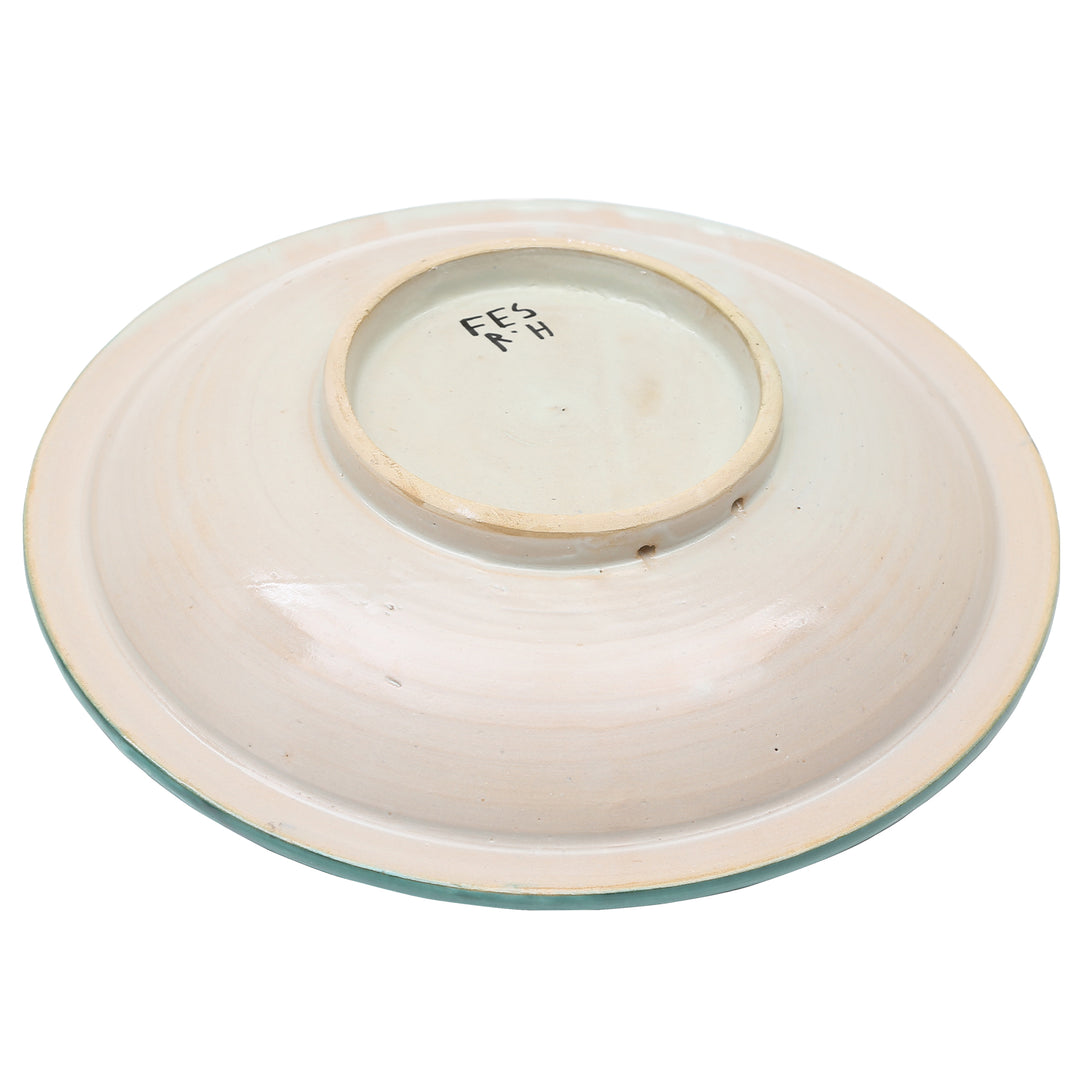 The bottom of the hand-crafted and glazed ceramic bowl from Fès