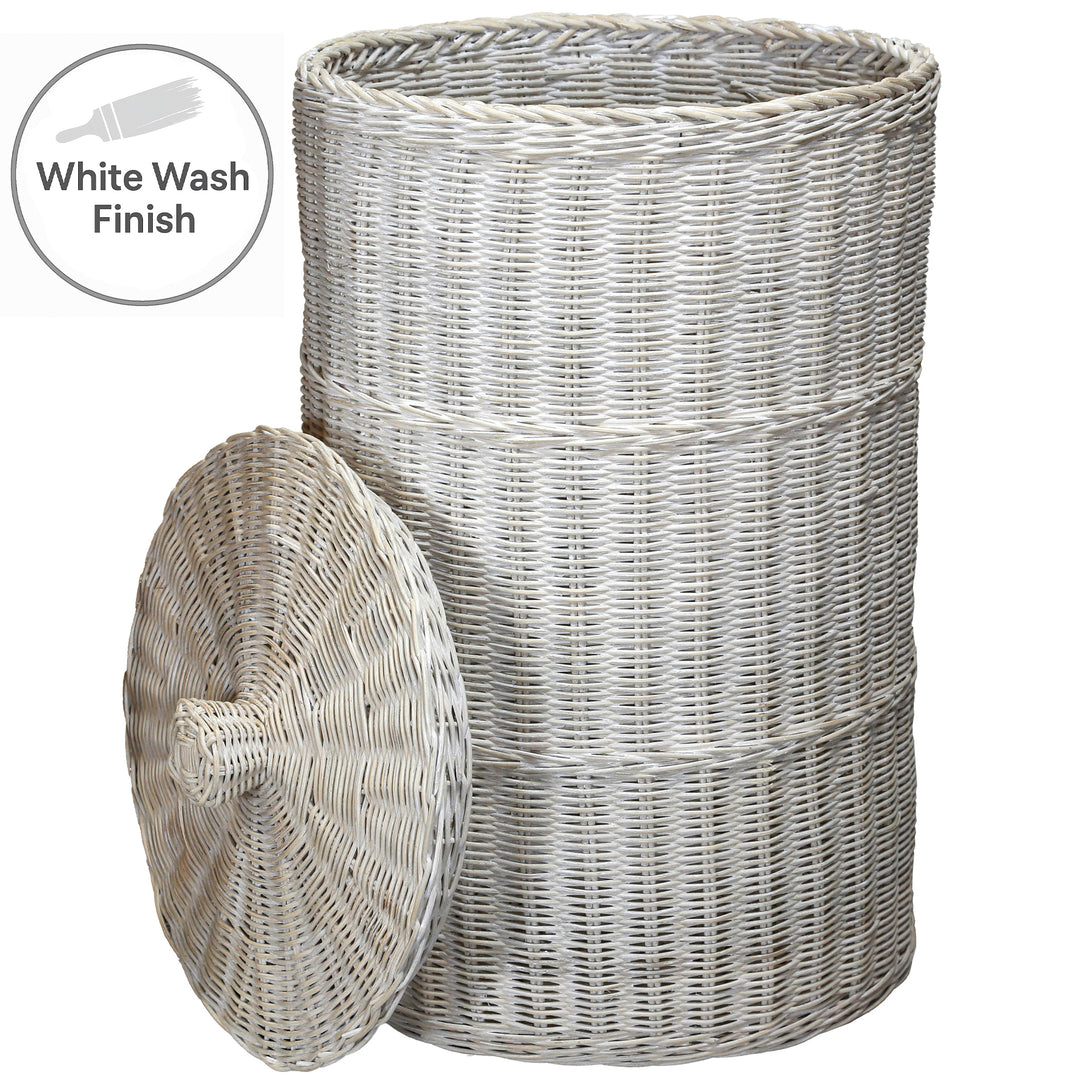Large, whitewashed laundry basket made of hand-woven rattan, with a removable lid in a white wash look