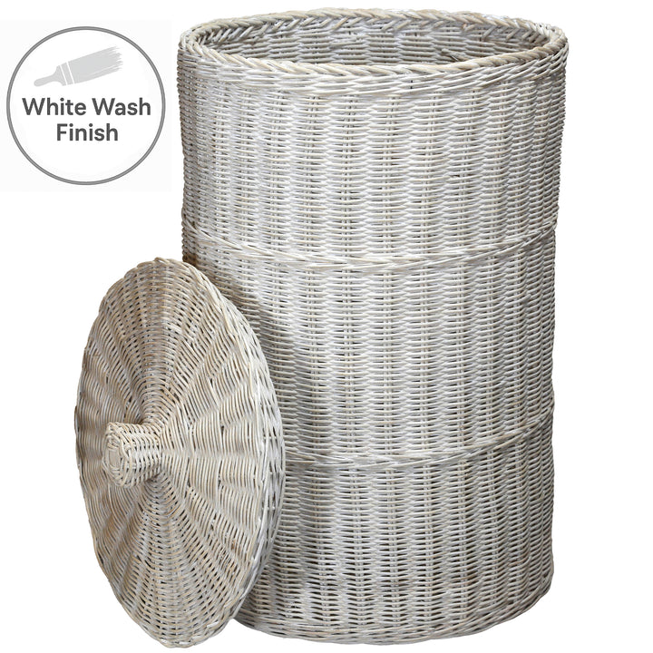 Large, whitewashed laundry basket made of hand-woven rattan, with a removable lid in a white wash look