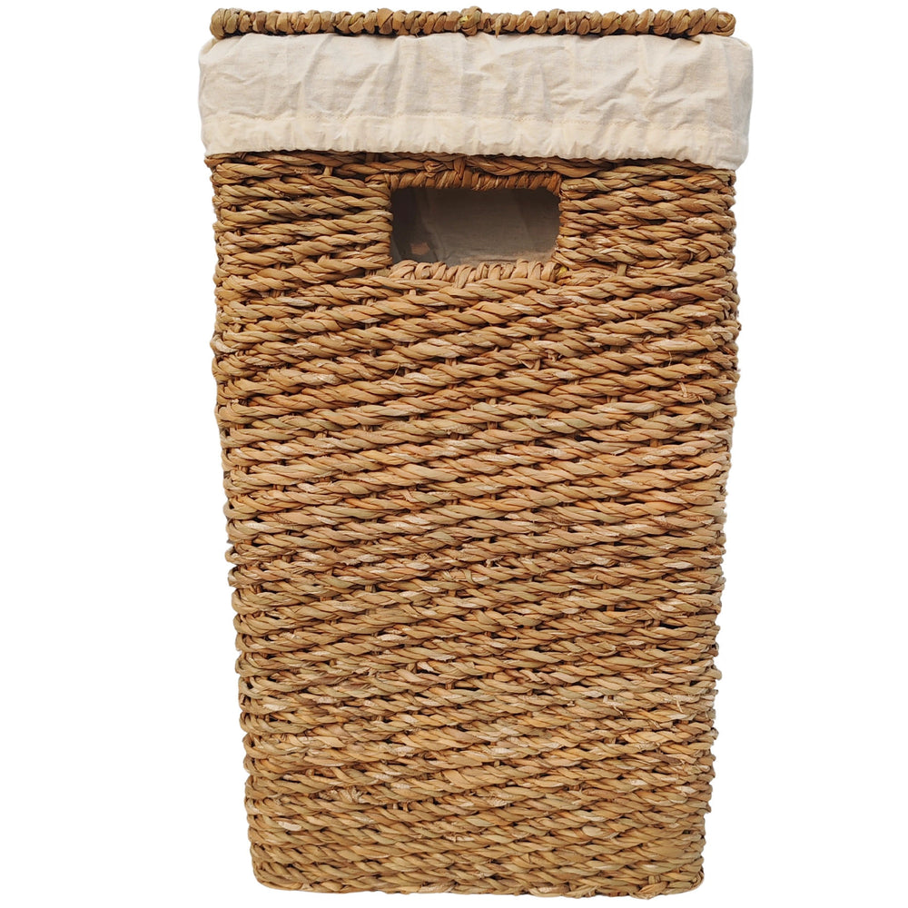 Rectangular laundry basket made of seagrass with a 50-liter capacity, a closed lid, a handle opening, and a light-colored fabric lining.