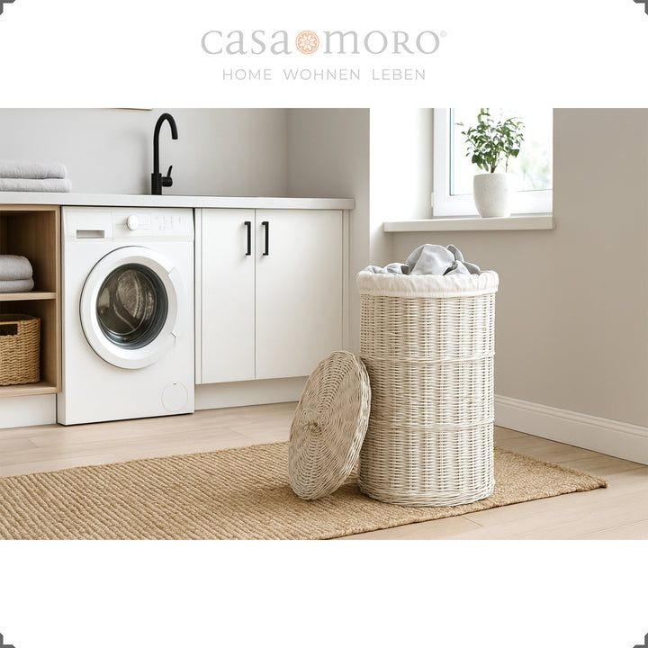 White Wash laundry basket in the laundry room, with a light inner bag and braided lid - harmonious in the modern interior