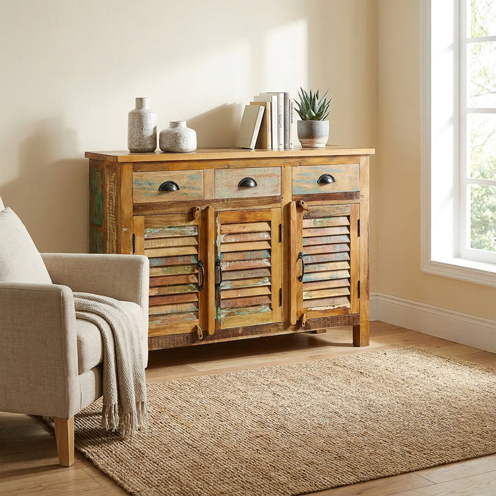 Highboard made of solid wood and reclaimed wood with vintage style drawers, placed in the living room